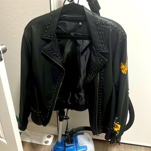 Torrid size 4 (~26) faux leather jacket with flowers butterflies. Never worn.